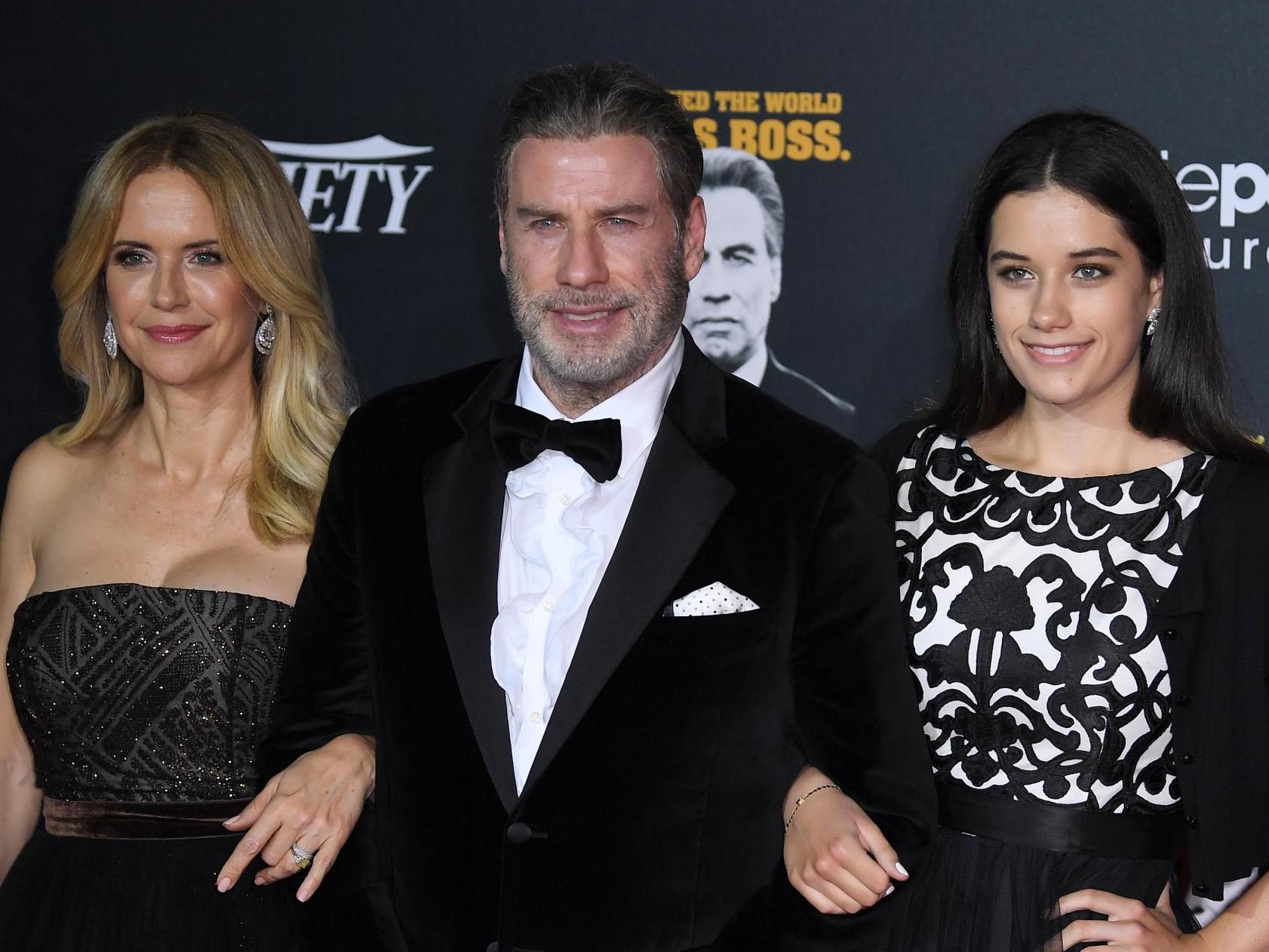 John Travolta dances with daughter in memory of his wife