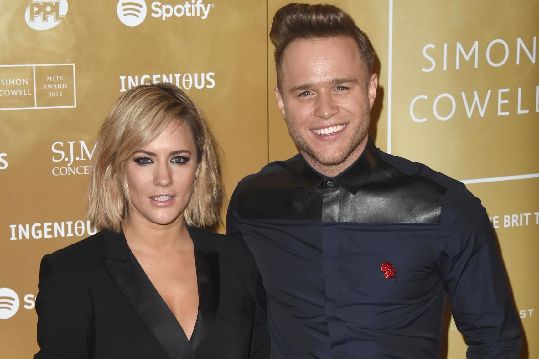 Olly Murs and Caroline Flack presented The Xtra Factor together for two years (Getty)