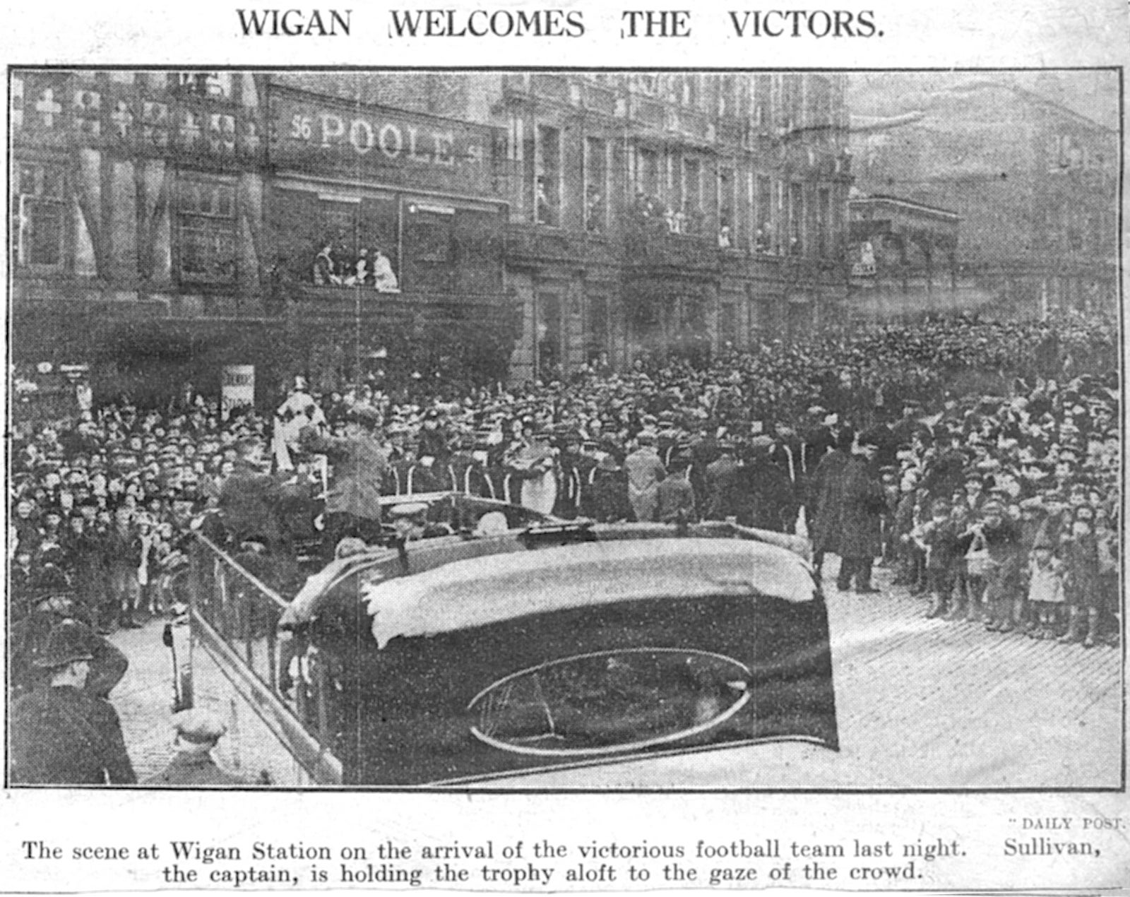 Winners Wigan celebrating their win outside Wigan station in 1929