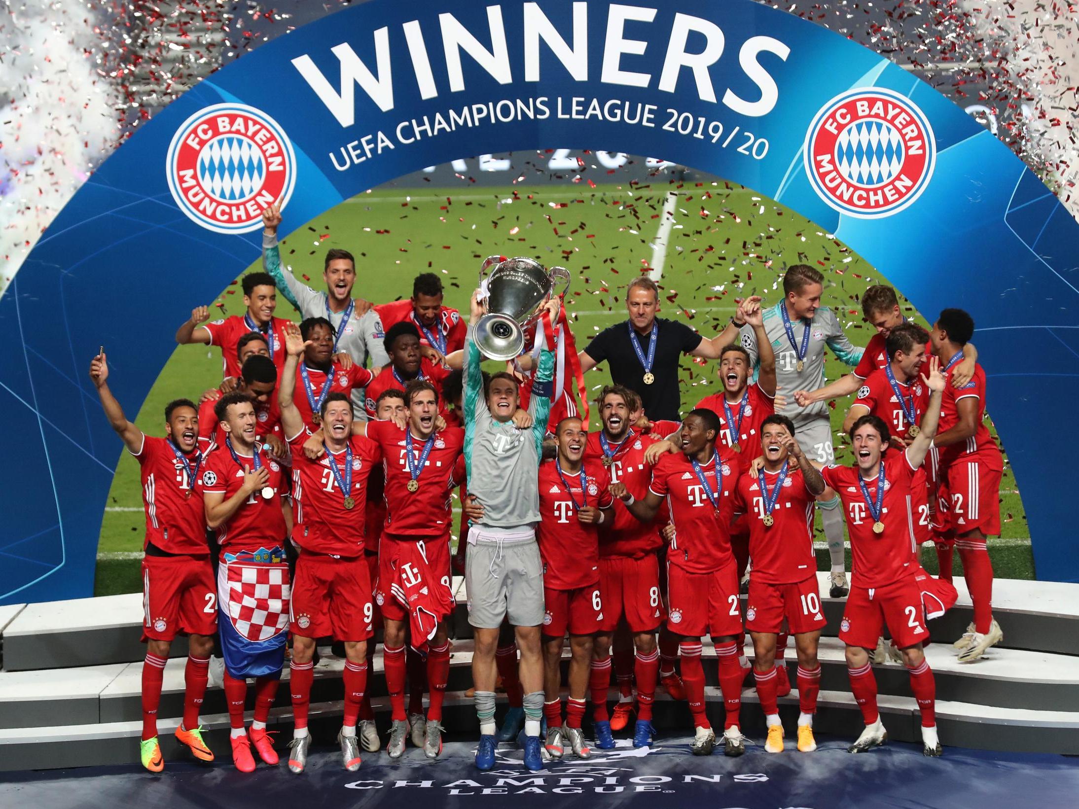 Manuel Neuer, captain of FC Bayern Munich lifts the UEFA Champions League Trophy