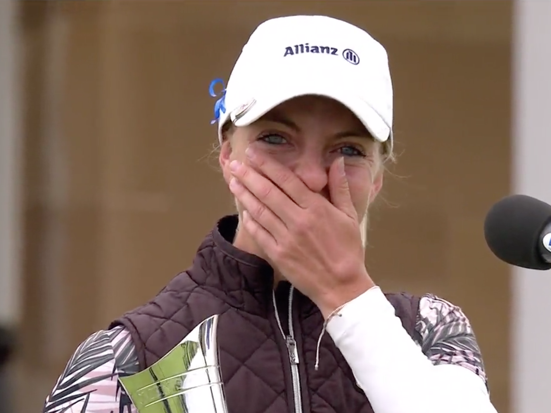 Popov reacts after winning the AIG Open