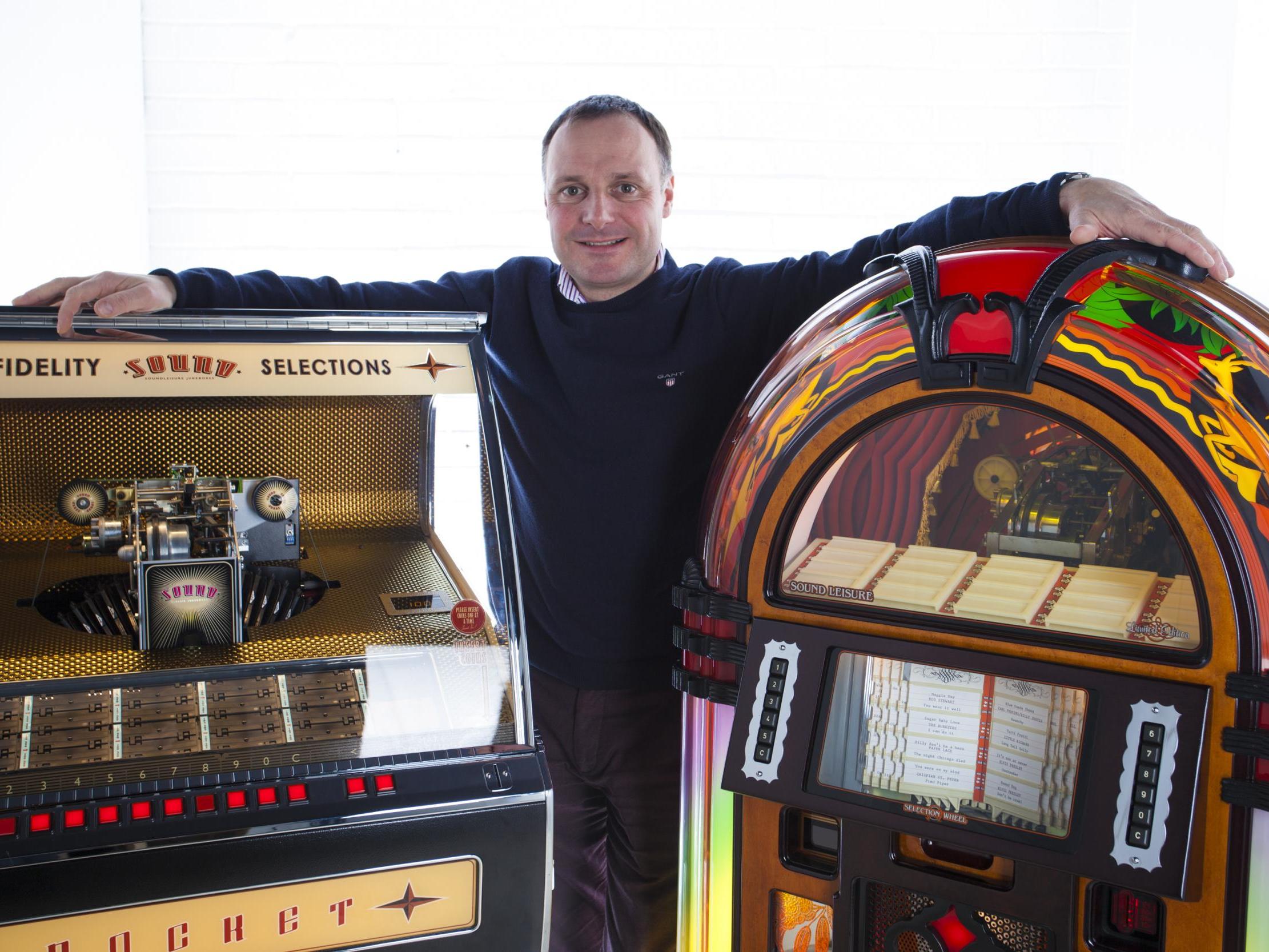 Chris Black with his beloved jukeboxes