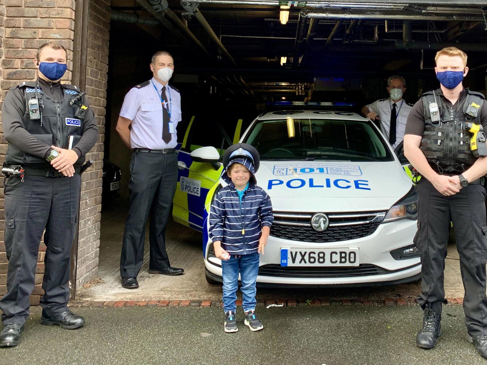 Josh toured his local station with West Mercia Police officers, including Superintendent Jim Baker