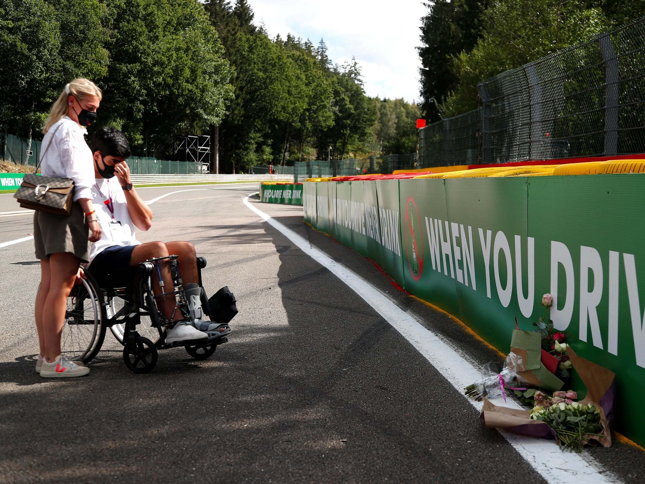 Juan Manuel Correa visits the site of his crash with Anthoine Hubert