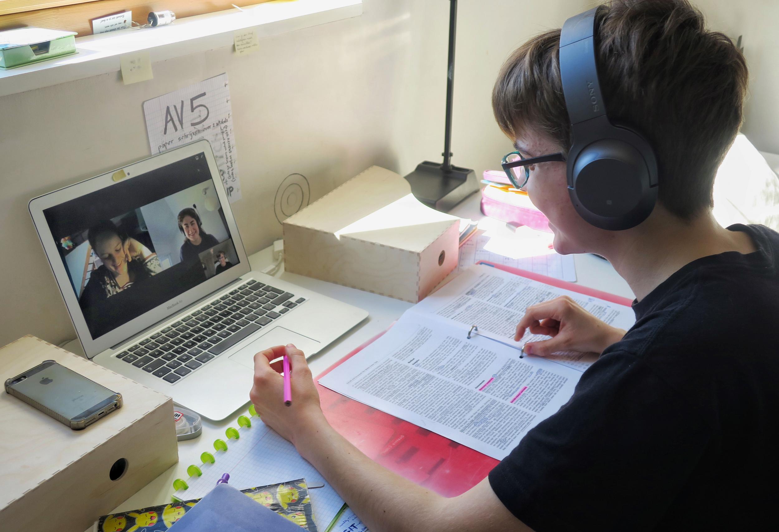 A psychology student studies with two friends over video chat in Belgium in March, just after new measures were implemented in the country to curb the spread of Covid-19