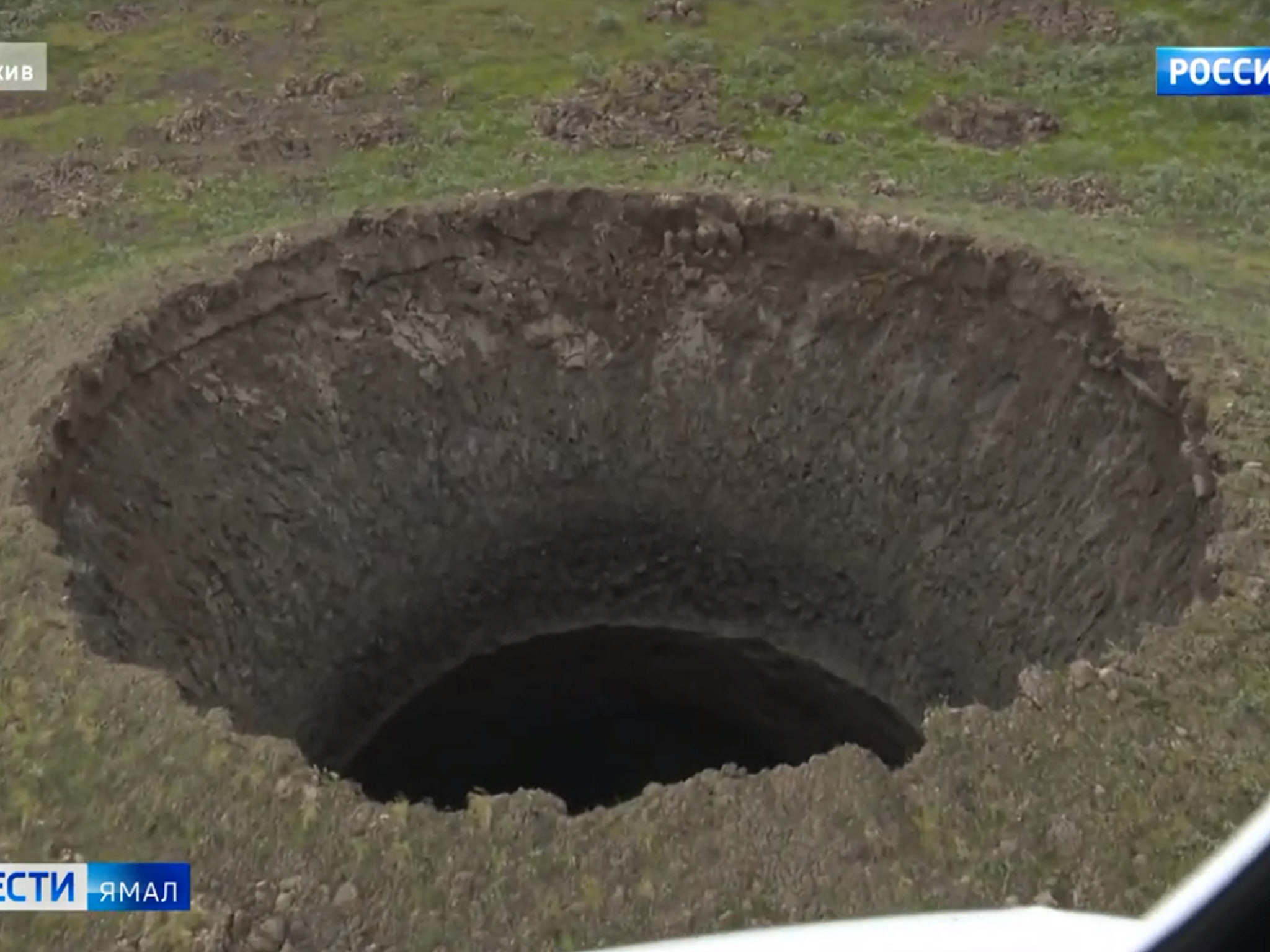 A Vesti Yamal TV crew discovered a 165ft-deep crater in Russia's Arctic region while flying over the Yamal peninsula in July 2020.