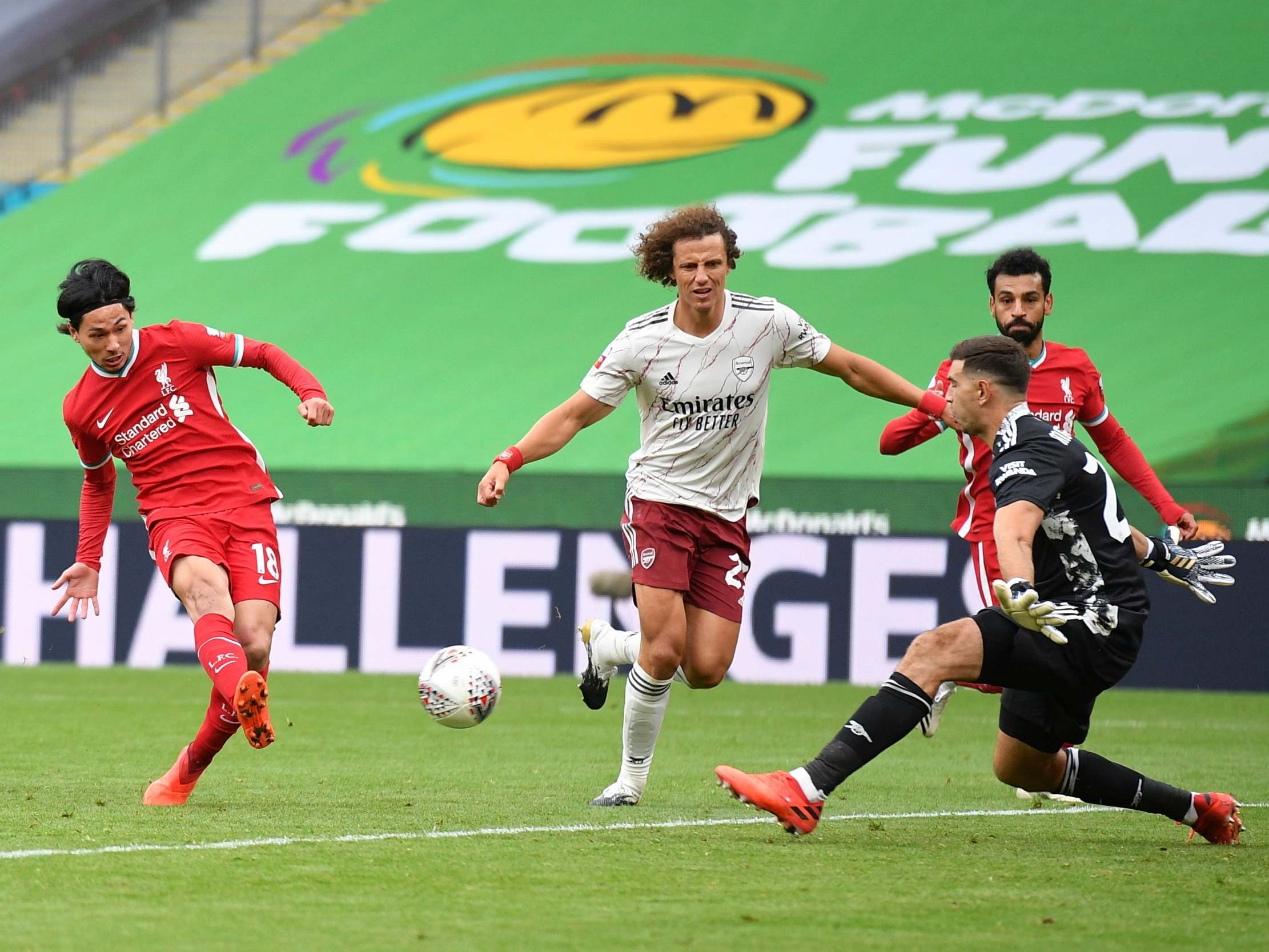 Takumi Minamino scores Liverpool's equaliser in the Community Shield