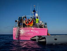 Banksy-funded refugee rescue boat helped by Italian coastguard after becoming stranded in Mediterranean