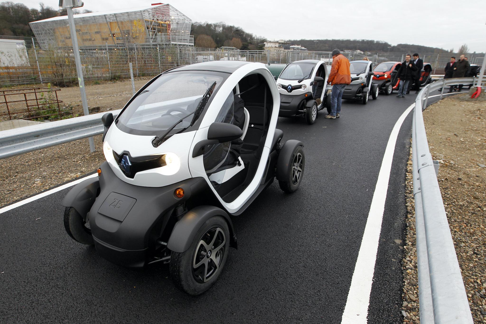 Renault Twizy vehicles on a test track. Previous attempts to combine cars and bikes have struggled with both regulatory hurdles and mockery