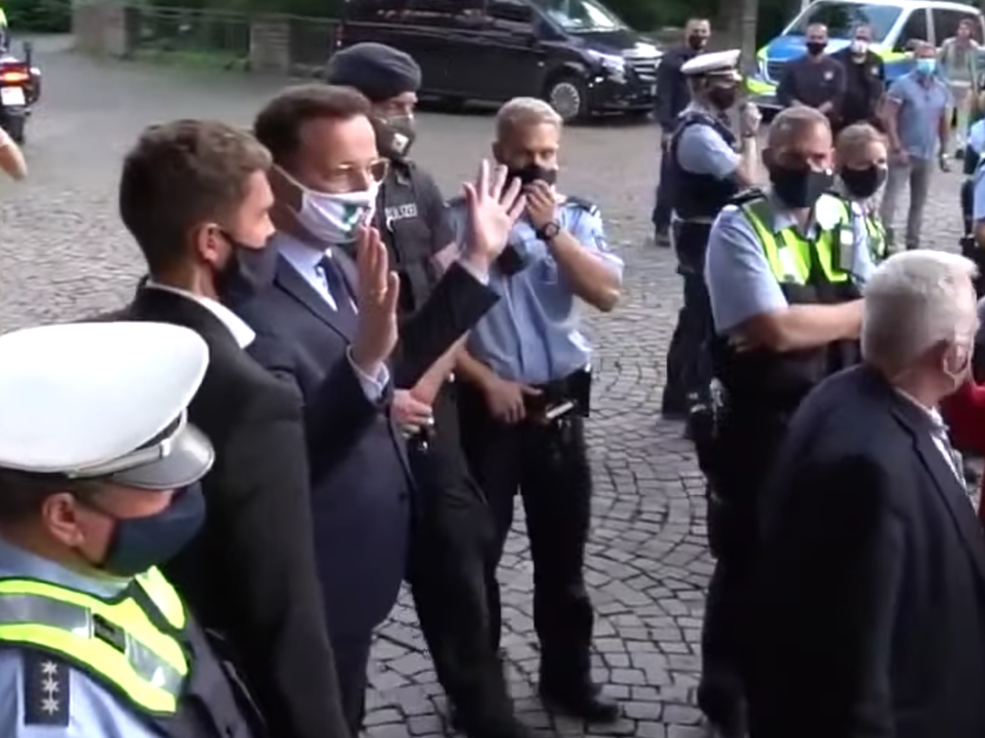 Jens Spahn faces down homophobic abuse as he attempts to reason with anti-lockdown protesters