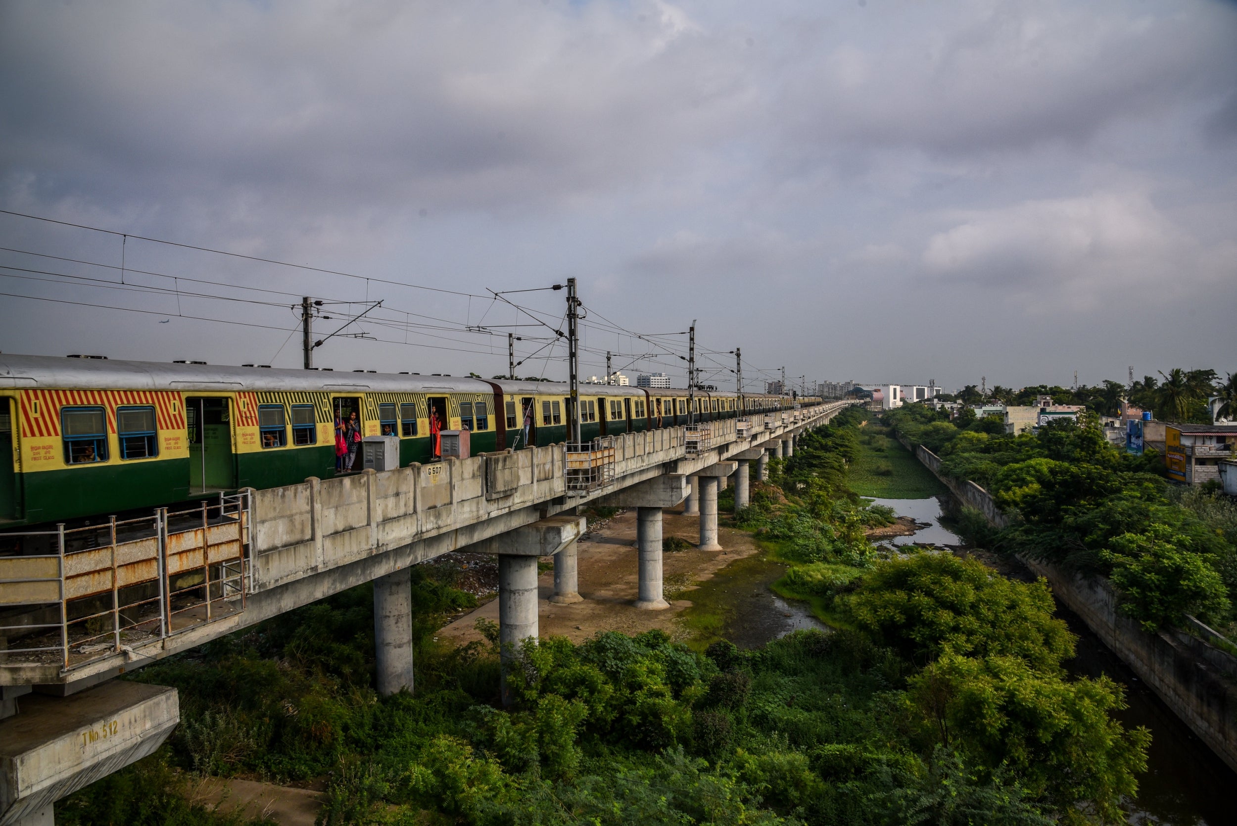 Hundreds of nomadic people sleep around the cavernous and often abandoned railway buildings