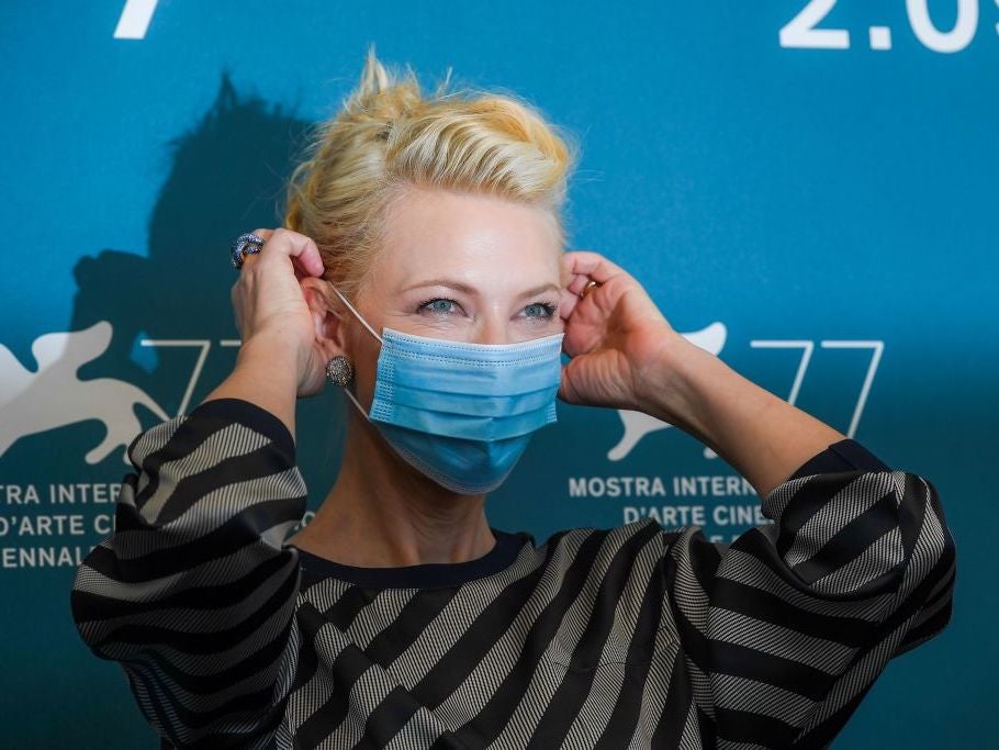 A masked Cate Blanchett attends the opening photocall for this year's Venice Film Festival