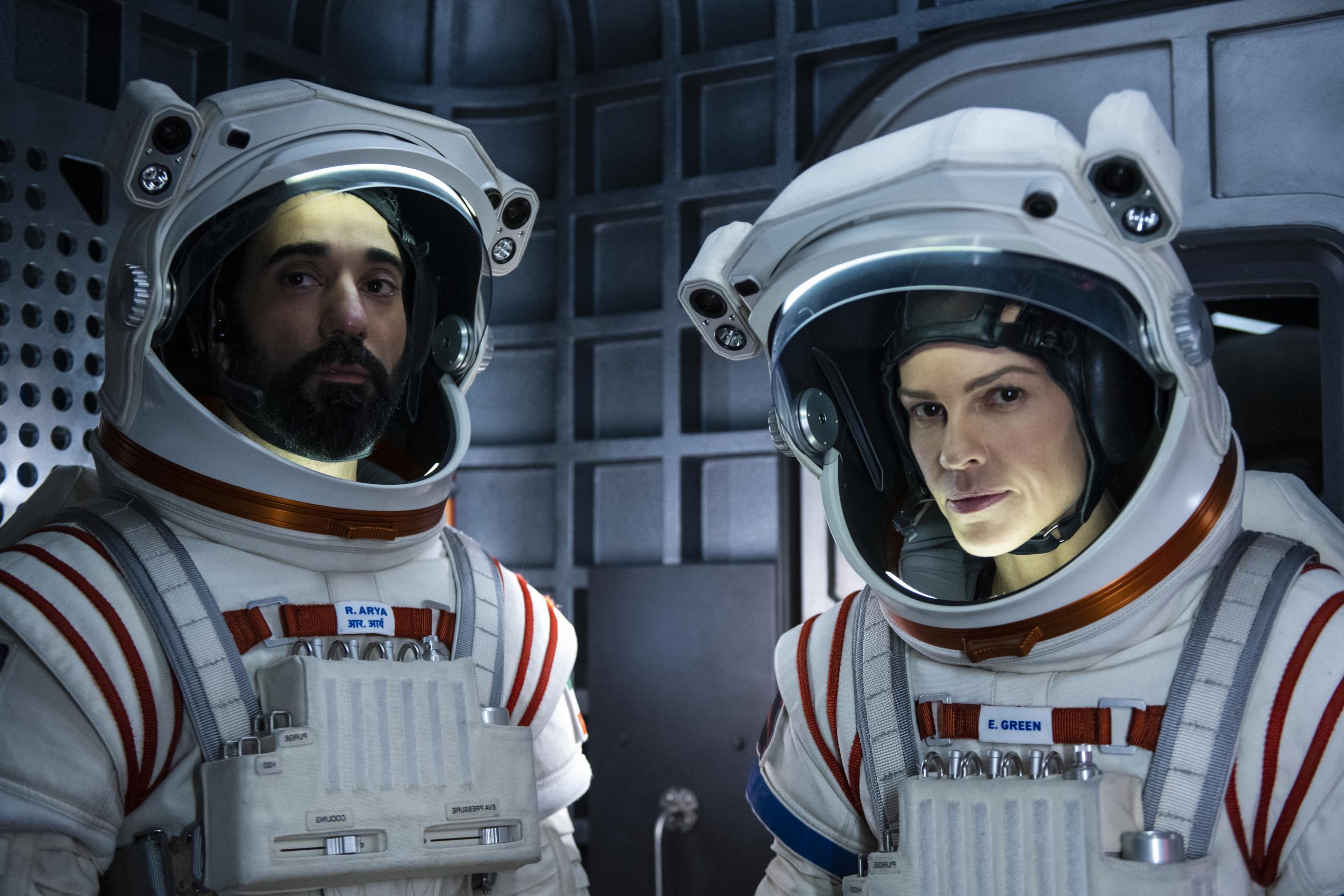 Ray Panthaki and Hilary Swank in ‘Away’