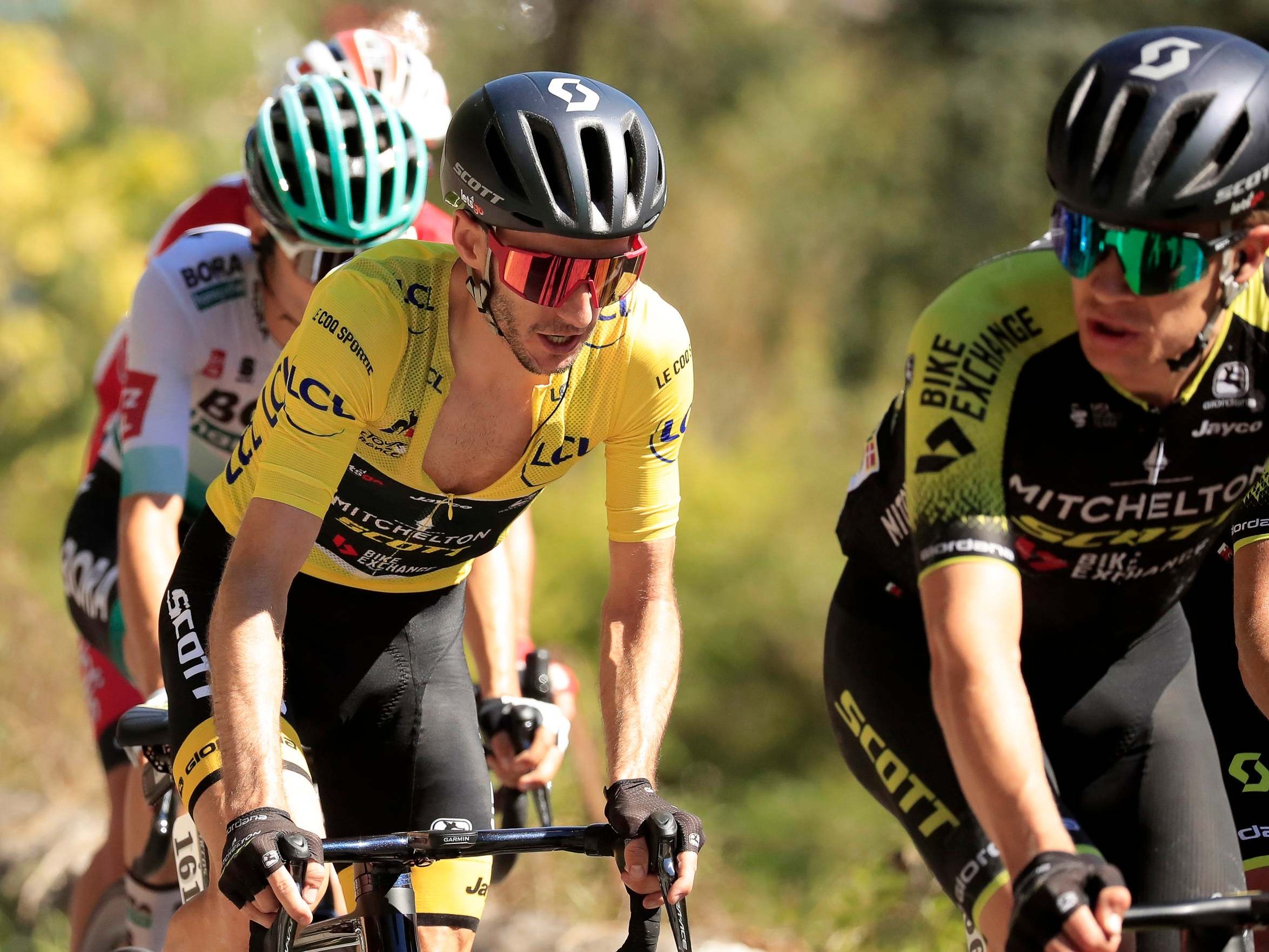 Adam Yates wearing the yellow jersey