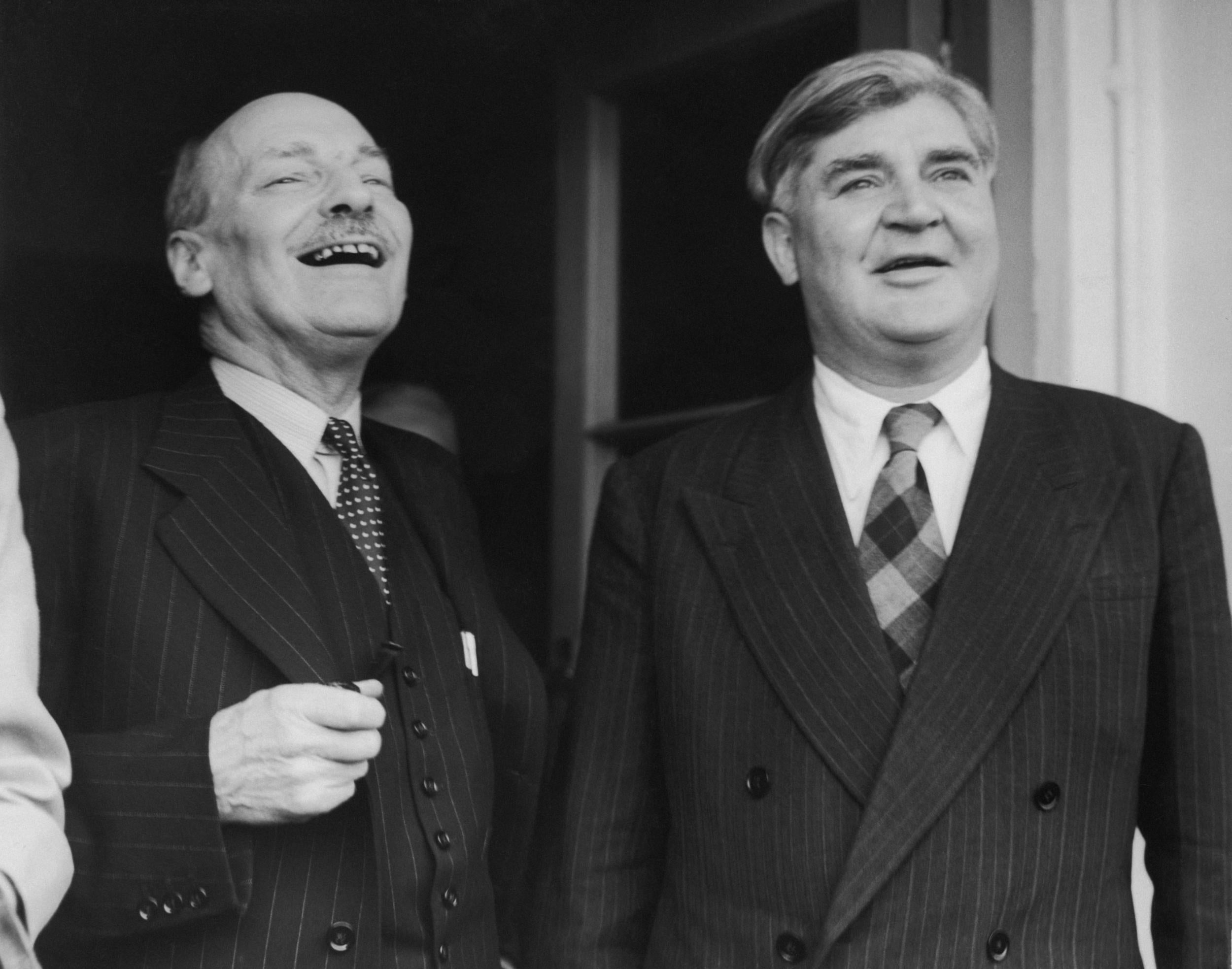 Clement Attlee and Aneurin Bevan leaving London on the first stage of a visit to China in 1954