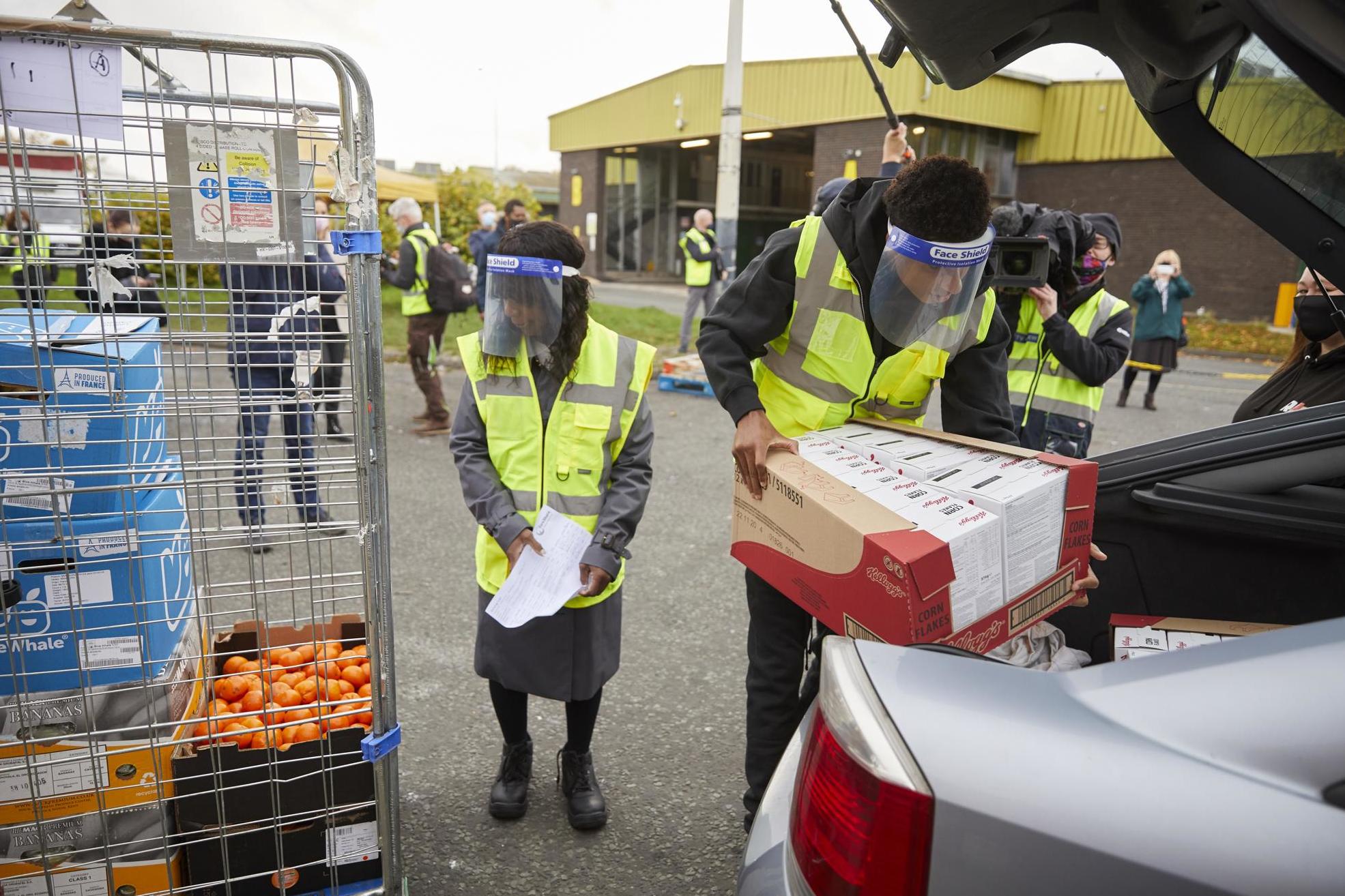 Marcus Rashford and his mother help FareShare Greater Manchester distribute food