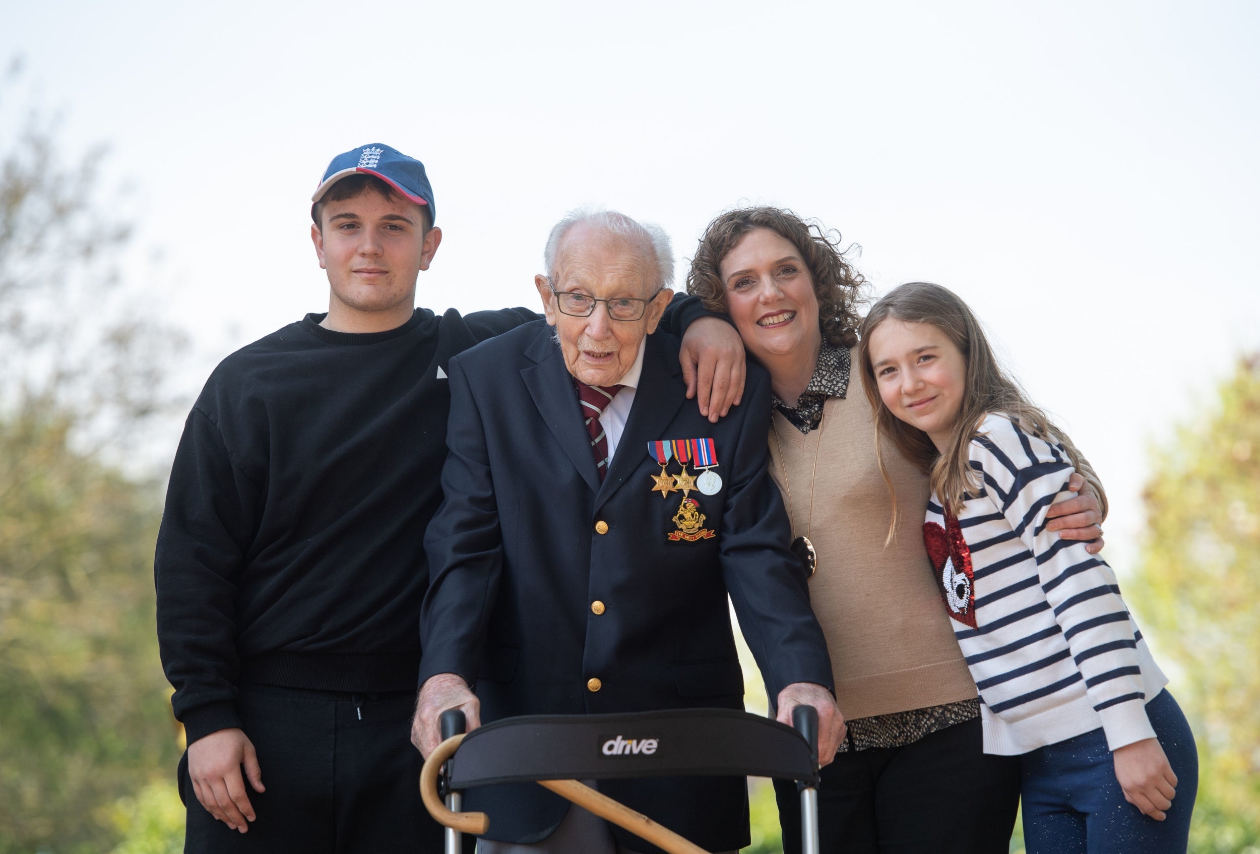 Captain Tom Moore, with his family including his daughter Hannah Ingram-Moore - they set the Foundation up to continue his fundraising work