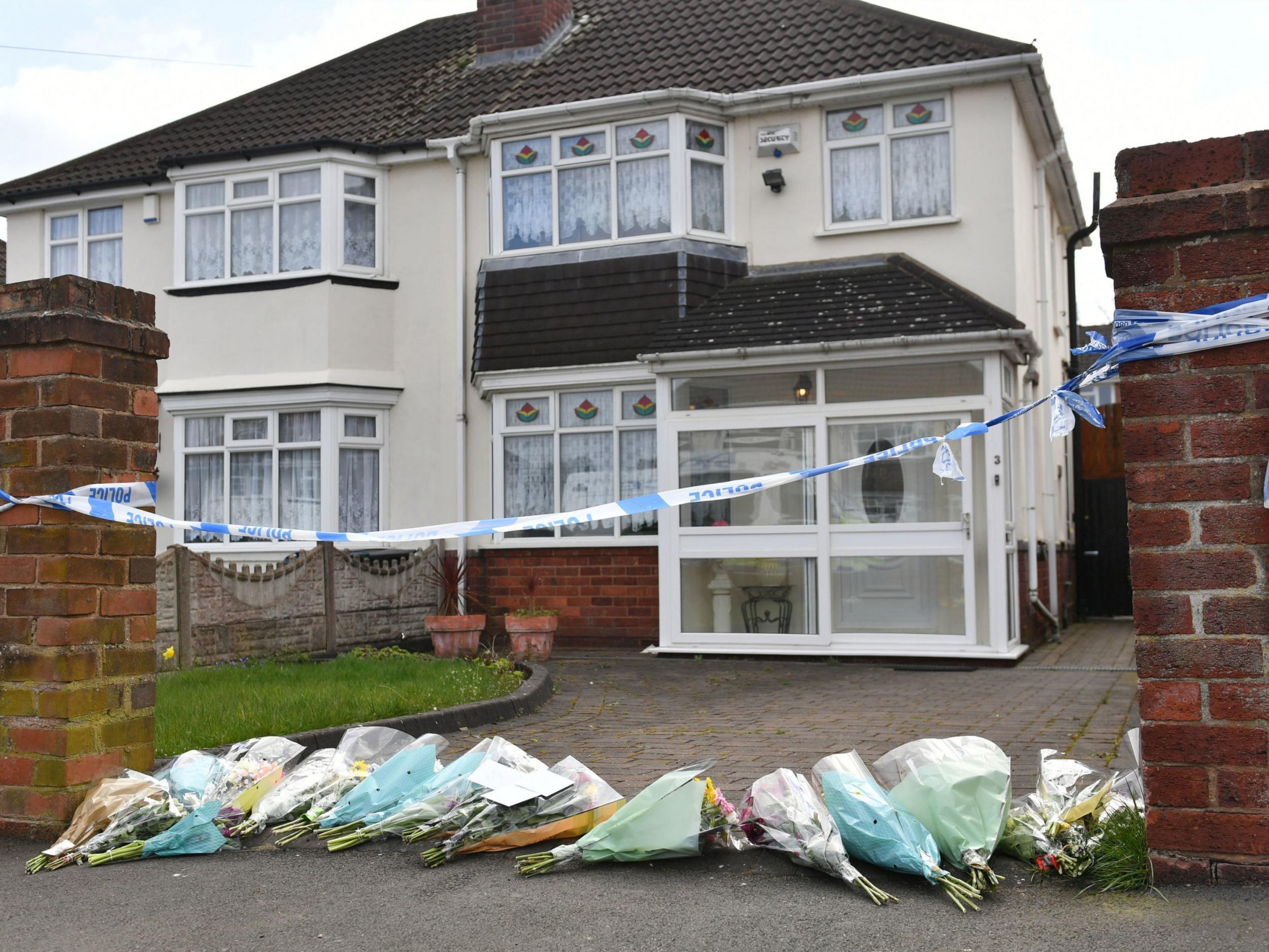 Flowers were laid at the scene where Ms Downer died