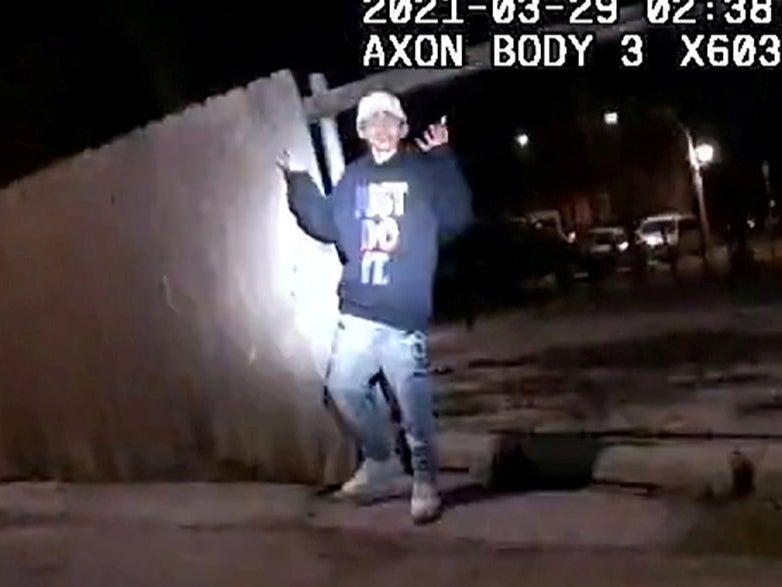 Adam Toledo, 13, holds up his hands a split second before he was shot by police