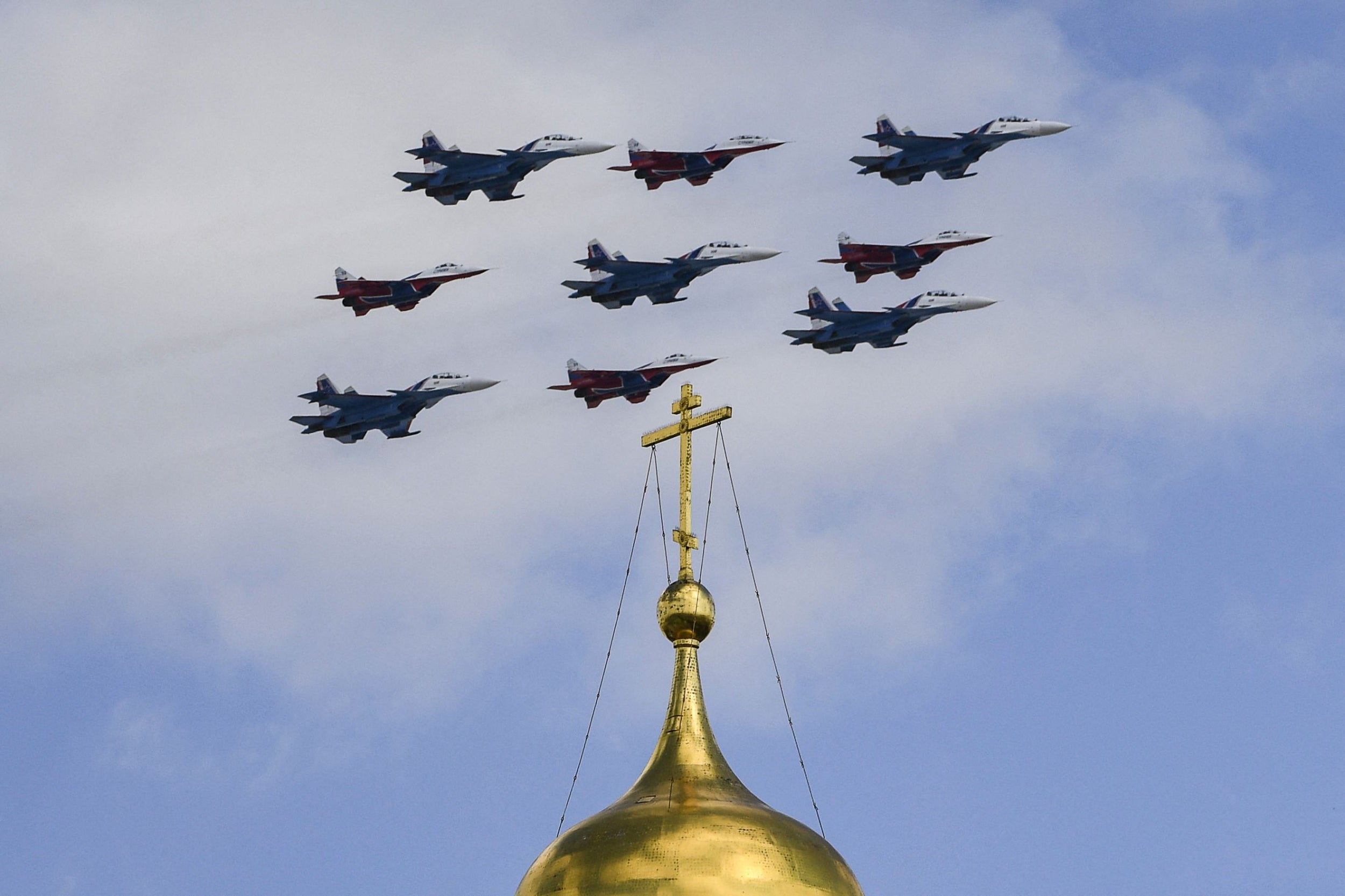 Russian MiG-29 jet fighters take part in an air display